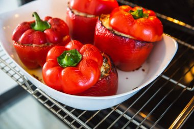 baked pepper with minced meat and rice, with the addition of mozzarella cheese
