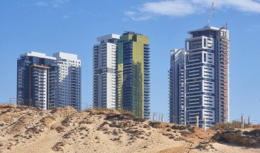 Bat Yam - Israeli desert city. Building yard of Housing construction of houses in a new area of the city Holon in Israel