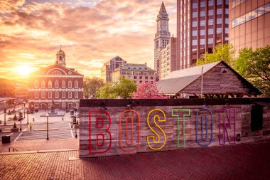 View of the architecture of Boston in Massachusetts, USA at sunset showcasing the Faneuil Hall and Quincy Market at Government Center. clipart
