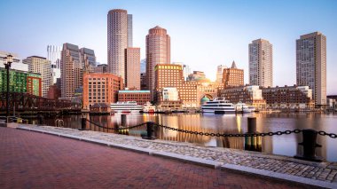 The iconic Boston Harbor at sunrise in Massachusetts, USA. A post card of Boston. clipart