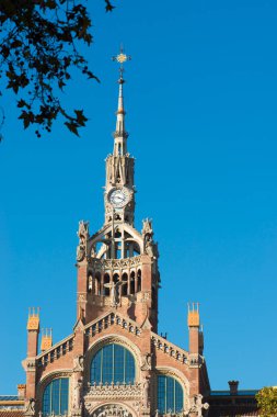 Detail of the facade of the Hospital de la Santa Cruz y San Pablo, located in a group of buildings located in Barcelona (Spain)