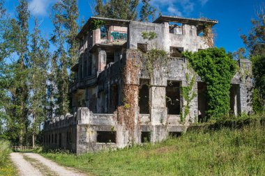CESURAS, SPAIN - JUNE 10, 2017: Ruins of the tuberculosis hospital project in the year 1925, which was later abandoned.