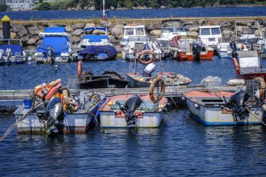 PONTEVEDRA, SPAIN - AUGUST 9, 2022: Dock of the artisanal fishing pier located in the Vigo estuary, in the small village of Arcade, in Galicia (Spain)