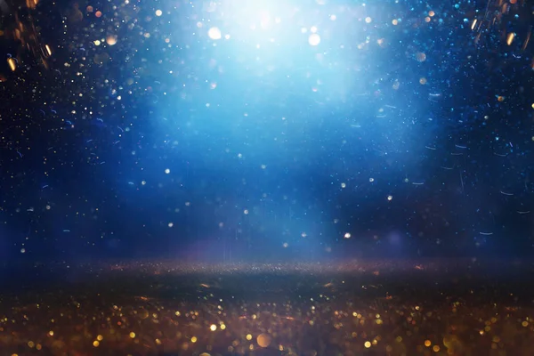 Background Abstract Glitter Lights Gold Blue Black Focused — Stock Photo, Image
