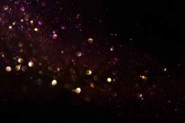 soyut glitter ışıkları arka plan. altın ve siyah. de odaklı