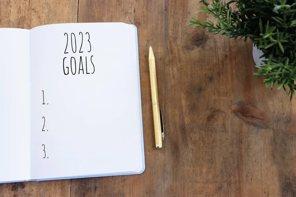 Business Concept Top View 2023 Goals List Notebook Wooden Desk — Stock Photo, Image