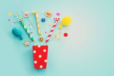 Top view image of party and present objects on pastel background