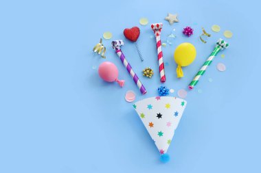 Top view image of party and present objects on pastel background