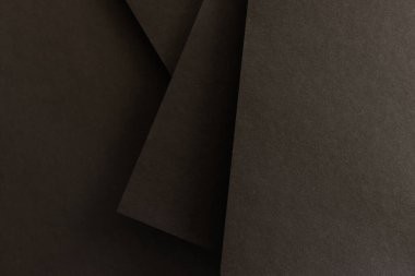 Çizgili ve kağıt desenli soyut bir arkaplan. Siyah renk