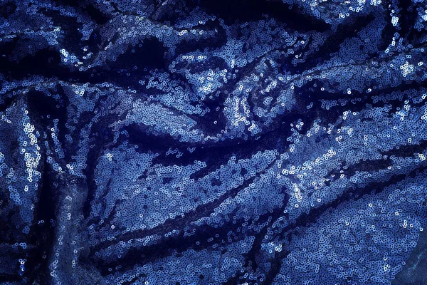 美しいダークブルーのスパンコール生地を背景に — ストック写真