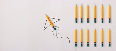 Uçak metaforundaki kurşun kalem görüntüsü. Liderlik ve eğitim fikri