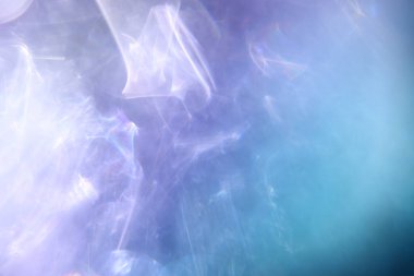 Parlak renkli, eğimli ve dalgalı desenli soyut arkaplan