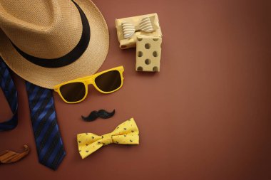 Father's day concept over brown background. top view, flat lay