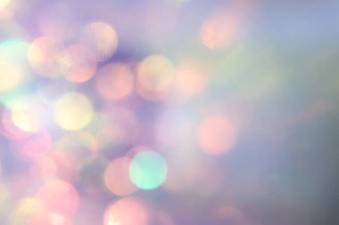 Soyut altın, pembe ve mor parıltılı ışıkların pastel arka planı. Odaklanamadı