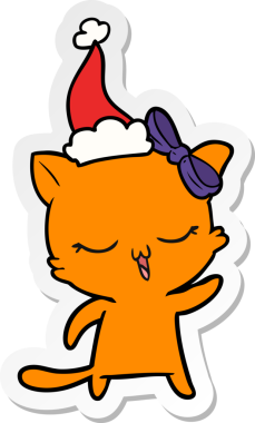 Bir insan tarafından çizilmiş Noel Baba şapkası takan bir kedinin el yazısı.