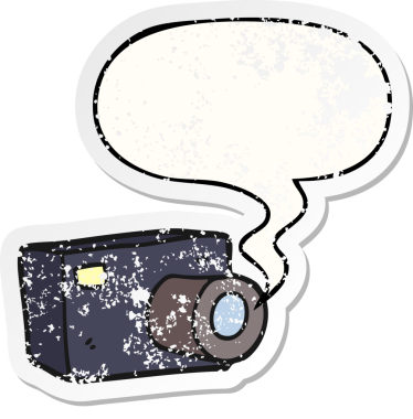 Konuşma baloncuğu olan karikatür kamerası bir insan tarafından çizilmiş sıkıntılı eski bir çıkartma