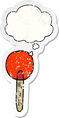 Düşünce baloncuklu çizgi film şekeri insan tarafından çizilmiş yıpranmış bir çıkartma.