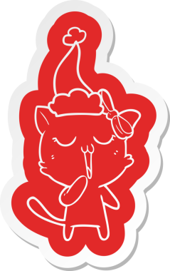 Bir insan tarafından çizilmiş Noel Baba şapkası takan bir kedinin garip karikatür çıkartması.