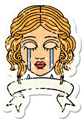 Bir insan tarafından çizilmiş kadın yüzü dövmeli eski bir etiket.