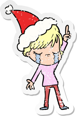 Bir insanın çizdiği Noel Baba şapkasıyla ağlayan bir kadının el yazısı.