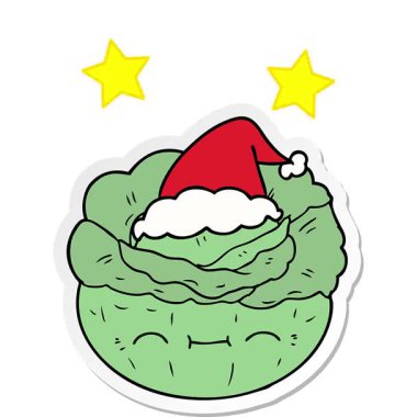 Basit bir döngü hareketli el çizimi. Etikette Noel Baba şapkası takan bir lahana.