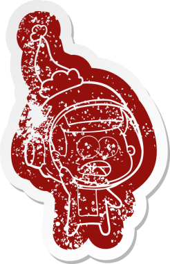 Bir insan tarafından çizilmiş Noel Baba şapkası giyen şaşırmış bir astronotun garip bir karikatürü.