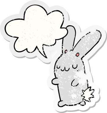 Konuşma baloncuğu olan sevimli çizgi film tavşanı bir insan tarafından çizilmiş sıkıntılı eski bir çıkartma