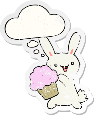 Üzerinde düşünce baloncuğu olan tatlı çizgi film tavşanı insan tarafından çizilmiş yıpranmış bir çıkartma.