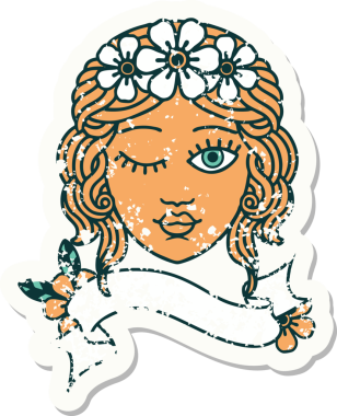 Bir insan tarafından çizilmiş, üzerinde bakirelerin yüzü olan eski bir çıkartma.