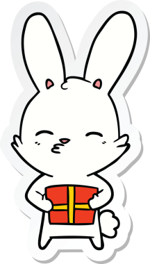 Bir insan tarafından çizilmiş meraklı bir tavşan çizgi filminin çıkartması.