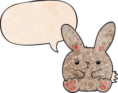 Konuşma baloncuklu çizgi film tavşanı insan tarafından çizilmiş.