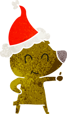 Dişi ayı eli, bir insan tarafından çizilmiş eski bir Noel Baba şapkası çizmiş.