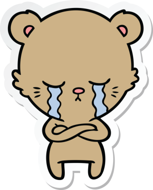 Ağlayan çizgi film ayısının çıkartması. Kollarını katlamış bir insan tarafından çizilmiş.