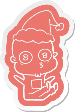 Bir insan tarafından çizilmiş Noel Baba şapkası giyen tuhaf kel bir uzaylının çizgi film çıkartması.