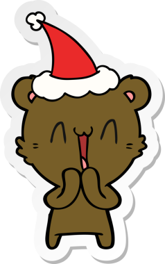 Mutlu ayı eli çizilmiş bir insan tarafından çizilmiş Noel Baba şapkası.