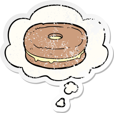 Düşünce baloncuklu çizgi film bisküvisi insan tarafından çizilmiş yıpranmış bir çıkartma.