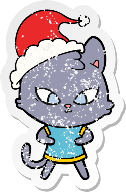 Bir insan tarafından çizilmiş Noel Baba şapkası takan bir kedi çizilmiş.