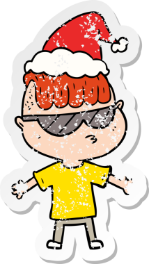 Bir insan tarafından çizilmiş, güneş gözlüğü takan, Noel Baba şapkası takan bir çocuk.