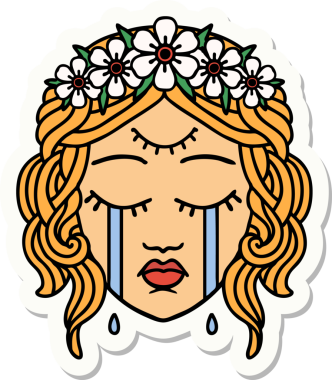 Geleneksel kadın yüzü stili bir dövme çıkartması. Üçüncü gözü ve bir insan tarafından çizilmiş çiçek taçı.