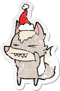 Kızgın kurt eli, bir insan tarafından çizilmiş Noel Baba şapkasının üzgün çıkartmasını çizmiş.