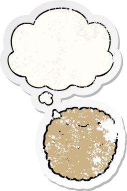 Düşünce baloncuklu çizgi film bisküvisi insan tarafından çizilmiş yıpranmış bir çıkartma.