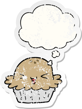 Düşünce baloncuğu olan şirin bir çizgi film pastası bir insan tarafından çizilmiş yıpranmış bir çıkartma gibi.