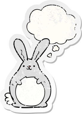Düşünce baloncuğu olan çizgi film tavşanı insan tarafından çizilmiş yıpranmış bir çıkartma.