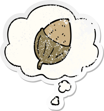 Düşünce baloncuklu çizgi film meşe palamudu insan tarafından çizilmiş yıpranmış bir çıkartma.