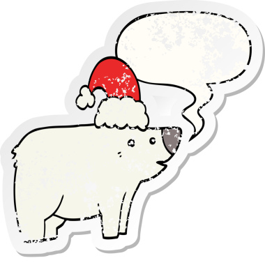 Karikatür ayısı Noel şapkası takıyor ve konuşma baloncuğu takıyor. Bir insan tarafından çizilmiş sıkıntılı eski bir çıkartma.