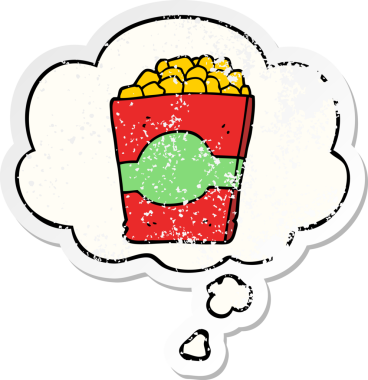 Düşünce baloncuklu çizgi film patlamış mısırı insan tarafından çizilmiş yıpranmış bir çıkartma gibi.