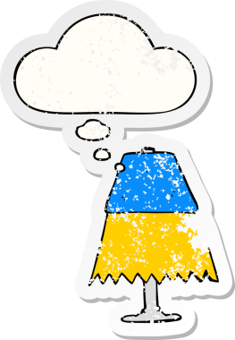 Düşünce baloncuğu olan çizgi film masası lambası insan tarafından çizilmiş yıpranmış bir çıkartma.