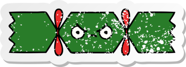 Bir insan tarafından çizilmiş tatlı bir noel krakerinin sıkıntılı çıkartması.