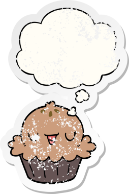 Düşünce baloncuğu olan şirin bir çizgi film pastası bir insan tarafından çizilmiş yıpranmış bir çıkartma gibi.