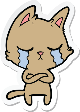 Ağlayan çizgi film kedisinin çıkartması. Kollarını katlamış bir insan tarafından çizilmiş.